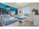 Fun bedroom with twin beds, themed decor and ample natural light at 3974 Lana Ave, Davenport, FL 33897