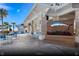 Exterior of the Windsor Island Resort clubhouse with outdoor seating and manicured landscaping at 3974 Lana Ave, Davenport, FL 33897