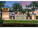 Entrance sign to Windsor Island Resort with a picturesque view of the community at 3974 Lana Ave, Davenport, FL 33897