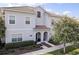 Inviting exterior view of home with a well-manicured front lawn and lush, green landscaping at 4967 Windermere Ave, Kissimmee, FL 34746