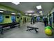 Bright gym featuring various fitness machines, weights and other equipment for community residents and guests at 4967 Windermere Ave, Kissimmee, FL 34746