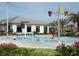 Gathering-friendly splash pad with colorful water features and ample seating for parents and children at 4967 Windermere Ave, Kissimmee, FL 34746