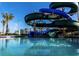 Community water park featuring a large waterslide and pristine pool at 4967 Windermere Ave, Kissimmee, FL 34746