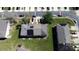 Aerial view of rooftop solar panels on condo building at 643 Captiva Cir, Kissimmee, FL 34741