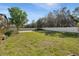 Lush lawn and privacy fence create a serene backyard setting at 736 W Pinewood Ct, Lake Mary, FL 32746