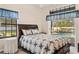 Bedroom featuring view of the pool through sliding glass door to the lanai at 736 W Pinewood Ct, Lake Mary, FL 32746