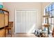 Bright bedroom features a window and a cat climbing tree at 736 W Pinewood Ct, Lake Mary, FL 32746