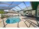 Inviting backyard pool area with covered patio and ample seating at 736 W Pinewood Ct, Lake Mary, FL 32746