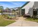 Inviting pool area with lush landscaping and a screened enclosure for year-round enjoyment at 736 W Pinewood Ct, Lake Mary, FL 32746