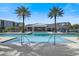 Community pool with clear water, poolside seating, and a welcoming atmosphere for residents at 7545 Laureate Blvd # 7202, Orlando, FL 32827