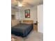 Well-lit bedroom with comfortable furnishings and a tennis theme at 7873 Dausset St, Orlando, FL 32827