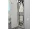 Built-in ironing board unit in cabinet in updated laundry room at 7873 Dausset St, Orlando, FL 32827