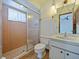 Bathroom with a tiled shower and vanity sink at 794 Elwood St, Deltona, FL 32725