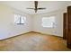 Bedroom with fan and neutral carpet, two windows let in ample light at 794 Elwood St, Deltona, FL 32725