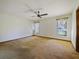 Bedroom with fan and neutral carpet, two windows let in ample light at 794 Elwood St, Deltona, FL 32725