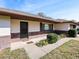 Charming front porch features a welcoming entrance and neatly trimmed landscaping around the property at 794 Elwood St, Deltona, FL 32725