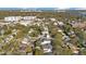 City skyline view of the neighborhood with mature trees and traditional-style homes with various roof types at 831 W Harvard St, Orlando, FL 32804