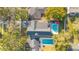 Real estate aerial view displaying a home's backyard pool, outdoor space, and overall property layout at 831 W Harvard St, Orlando, FL 32804