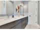 Modern bathroom featuring double sinks, sleek vanities, and contemporary fixtures at 831 W Harvard St, Orlando, FL 32804