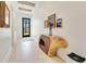 Bright foyer featuring stylish wood console table and front door view at 831 W Harvard St, Orlando, FL 32804