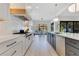 Stylish kitchen featuring modern cabinets, stainless steel appliances, a subway tile backsplash and an eat-in breakfast nook at 831 W Harvard St, Orlando, FL 32804