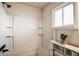 Cozy bathroom featuring a shower-tub combination, stylish vanity, and neutral decor at 9400 Ne 307Th Ct, Fort Mc Coy, FL 32134