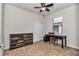 Bedroom with carpet, ceiling fan, and window with blinds and a view to outside at 9472 Sw 76Th St, Ocala, FL 34481