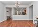 Dining Room with hardwood floors and view to kitchen with granite counter and stainless appliances at 9472 Sw 76Th St, Ocala, FL 34481