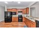 Spacious kitchen featuring ample counter space, stainless appliances and wood cabinets at 9472 Sw 76Th St, Ocala, FL 34481