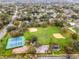 A stunning overhead view showcasing the community's amenities; baseball field, tennis, and playground at 112 E Cumberland Cir, Longwood, FL 32779