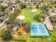 A beautiful aerial view of community amenities including tennis court, playground, and baseball field at 112 E Cumberland Cir, Longwood, FL 32779