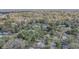 Wide aerial shot capturing property location within a tree filled neighborhood at 1129 Ne 12Th St, Ocala, FL 34470