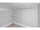 Walk-in closet with light gray walls and wire shelving at 1129 Ne 12Th St, Ocala, FL 34470