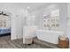 Modern bathroom featuring a soaking tub, glass shower stall, and neutral flooring at 11402 Camden Loop Way, Windermere, FL 34786