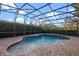 An in-ground swimming pool with an screened enclosure at 11733 Delwick Dr, Windermere, FL 34786