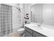 Bathroom featuring a shower-tub combo, with a well-lit vanity and toilet at 1714 Leatherback Ln, St Cloud, FL 34771