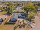 Aerial view of a house with mature trees and a defined yard in a neighborhood setting at 172 Post And Rail Rd, Longwood, FL 32750