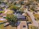 Overhead view of a home featuring a pool, fenced yard, and convenient street access at 172 Post And Rail Rd, Longwood, FL 32750