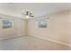 Neutral bedroom with carpet, a ceiling fan, and large windows offering ample natural light at 172 Post And Rail Rd, Longwood, FL 32750