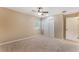 Inviting bedroom with neutral walls, plush carpeting, a closet, and natural light at 172 Post And Rail Rd, Longwood, FL 32750