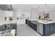 Stylish kitchen with a large island, stainless steel appliances, and wine storage at 2015 Summerfield Rd, Winter Park, FL 32792