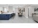 Open concept kitchen and dining area with modern finishes and stylish decor at 2015 Summerfield Rd, Winter Park, FL 32792