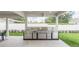 Outdoor kitchen with stainless steel appliances, perfect for outdoor entertaining and grilling at 2015 Summerfield Rd, Winter Park, FL 32792