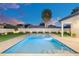 Backyard pool surrounded by lush landscaping, perfect for relaxation and entertainment at 2015 Summerfield Rd, Winter Park, FL 32792