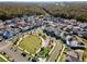 Community park and playground in a residential neighborhood lined with mature trees at 2331 Celebration Blvd, Celebration, FL 34747