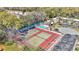 Overhead view of community tennis courts, pool, and complex at 2447 Ne 7Th St, Ocala, FL 34470