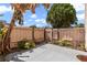 Private fenced backyard with a stone tile patio and tropical landscaping at 2447 Ne 7Th St, Ocala, FL 34470