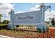 Entrance to the Avalon Park community with decorative landscaping and a welcoming sign at 2715 Rowan St, Tavares, FL 32778