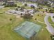 Aerial view of the community tennis courts and clubhouse at 2926 Boating Blvd, Kissimmee, FL 34746