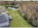 Aerial view of the backyard, showing proximity to a pond and preserved conservation area at 2926 Boating Blvd, Kissimmee, FL 34746